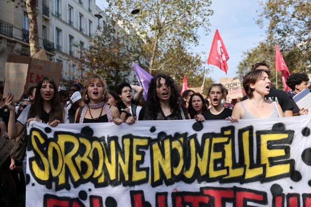 High school students at Sorbonne Nouvelle university march with a banner during a rally as part of a day of nationwide public sector strikes and demonstrations, in Paris, on September 29, 2026. Public sector workers, including firefighters, hold a one-day strike and demonstrations across France on September 29 in response to a call from a broad inter-union coalition, with the aim of putting pressure on the government two days before the presentation of the draft budget for 2027. (Photo by Anne-Christine POUJOULAT / AFP)