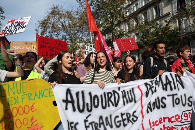 Youth march with a banner during a rally as part of a day of nationwide public sector strikes and demonstrations, in Paris, on September 29, 2026. Public sector workers, including firefighters, hold a one-day strike and demonstrations across France on September 29 in response to a call from a broad inter-union coalition, with the aim of putting pressure on the government two days before the presentation of the draft budget for 2027. (Photo by Anne-Christine POUJOULAT / AFP)