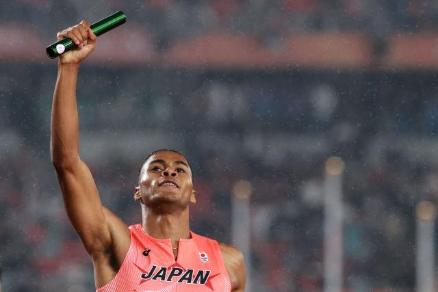 Japan's Yuki Joseph Nakajima celebrates winning the men's 4x400m relay final during the 2026 Asian Games at Nagoya City Mizuho Park Athletic Stadium in Nagoya, Aichi Prefecture on September 29, 2026. (Photo by DAVID GRAY / AFP)
