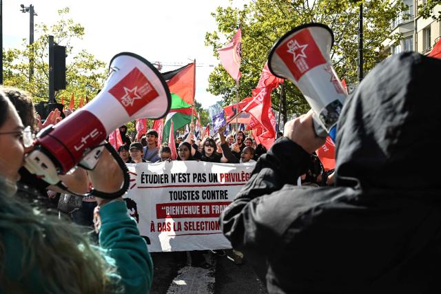 Protesters march during a day of nationwide public sector strikes and demonstrations, in Rennes, western France, on September 29, 2026. Public sector workers, including firefighters, hold a one-day strike and demonstrations across France on September 29 in response to a call from a broad inter-union coalition, with the aim of putting pressure on the government two days before the presentation of the draft budget for 2027. (Photo by Sebastien Salom-Gomis / AFP)