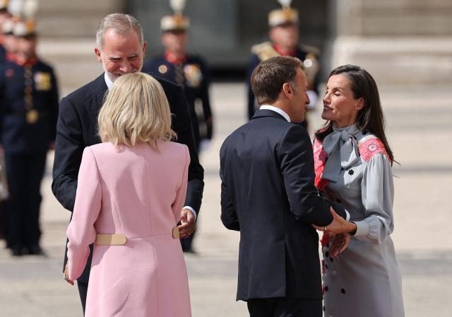Spain's King Felipe VI and Queen Letizia welcome French President Emmanuel Macron (2R) and his wife Brigitte Macron (back) during an official ceremony upon their arrival at Madrid's Royal Palace on September 29, 2026. French President Emmanuel Macron is on a two-day official visit in Spain. (Photo by Thomas COEX / AFP)