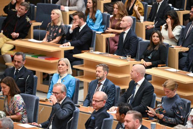 Sweden's Social Democratic Party leader Magdalena Andersson (2nd row, 2nd L) and Left Party leader Nooshi Dadgostar (3rd row, R) attend the opening of the Swedish Parliament Riksdagen on September 29, 2026 in Stockholm, as the parliament meets for the first plenary session after the general elections. (Photo by Jonathan NACKSTRAND / AFP)