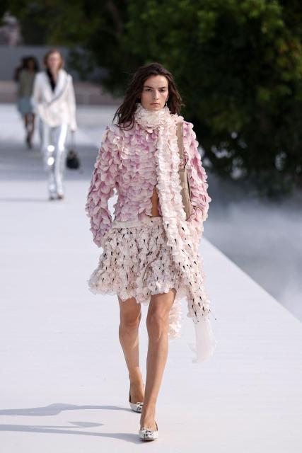 A model presents a creation during the Christian Dior Women's Spring/Summer 2027 collection fashion show as part of the Paris Fashion Week, in Paris on September 29, 2026. (Photo by SIMON WOHLFAHRT / AFP)