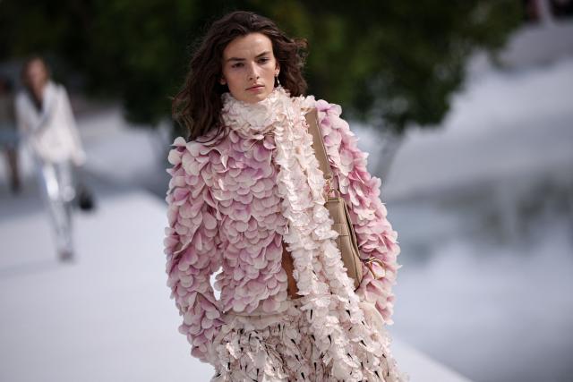 A model presents a creation during the Christian Dior Women's Spring/Summer 2027 collection fashion show as part of the Paris Fashion Week, in Paris on September 29, 2026. (Photo by SIMON WOHLFAHRT / AFP)