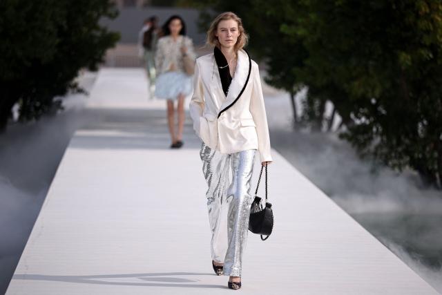 A model presents a creation during the Christian Dior Women's Spring/Summer 2027 collection fashion show as part of the Paris Fashion Week, in Paris on September 29, 2026. (Photo by SIMON WOHLFAHRT / AFP)