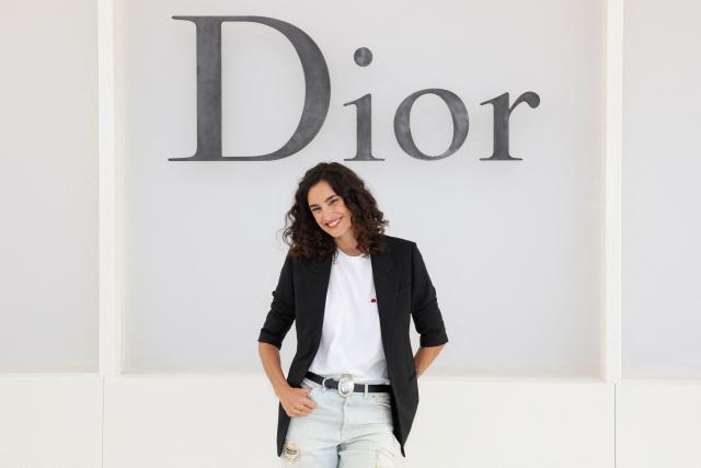French actress and model Nine d'Urso poses for a photocall ahead of the Christian Dior Women's Spring/Summer 2027 collection fashion show as part of the Paris Fashion Week, in Paris on September 29, 2026. (Photo by Xavier GALIANA / AFP)
