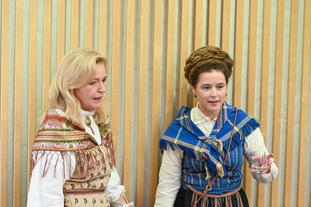 The Green Party's spokesperson Amanda Lind (R) speaks with Centre Party leader Elisabeth Thand Ringqvist as they attend the opening of the Swedish Parliament Riksdagen on September 29, 2026 in Stockholm, as the parliament meets for the first plenary session after the general elections. (Photo by Jonathan NACKSTRAND / AFP)