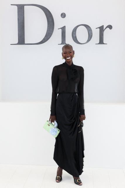 Sudanese model Adot Gak poses for a photocall ahead of the Christian Dior Women's Spring/Summer 2027 collection fashion show as part of the Paris Fashion Week, in Paris on September 29, 2026. (Photo by Xavier GALIANA / AFP)