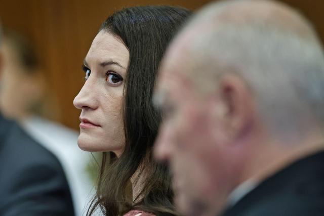 (L/R) Lindsay Clancy and her attorney, Kevin Reddington, attend a status hearing for the Clancy case at the Plymouth County Superior Court in Plymouth, Massachusetts on September 29, 2026. Lindsay Clancy is appearing in court for the first time since the judge declared a mistrial on September 4, after a jury was unable to reach a unanimous verdict in the high-profile case of Clancy, an American woman who killed her three young children. (Photo by Greg Derr / POOL / AFP)