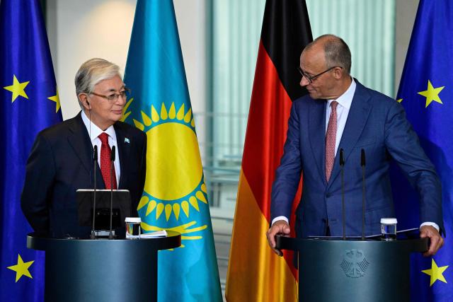 German Chancellor Friedrich Merz (R) and Kazakhstan's President Kassym-Jomart Tokayev address a press conferenceat the Chancellery in Berlin on September 29, 2026. (Photo by John MACDOUGALL / AFP)