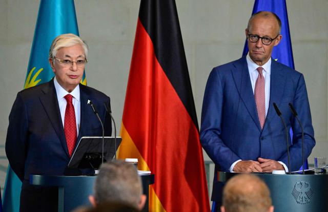 German Chancellor Friedrich Merz (R) and Kazakhstan's President Kassym-Jomart Tokayev address a press conference at the Chancellery in Berlin on September 29, 2026. (Photo by John MACDOUGALL / AFP)