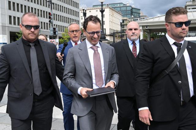 Anthropic CEO Dario Amodei (C) arrives near the White House ahead of a planned meeting with US President Donald Trump, in Washington, DC, on September  29, 2026. Leading artificial intelligence executives will meet at the White House today with President Donald Trump as Congress calls for stronger industry oversight. The gathering comes quickly after tech giant OpenAI's cancellation of the release of its newest model due to safety concerns, and a series of revelations that the technology had gone rogue. (Photo by Oliver Contreras / AFP)