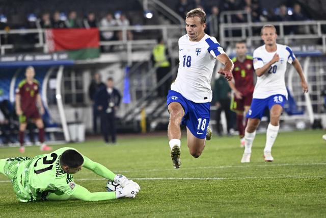Finland's forward #18 Topi Keskinen makes an attempt to score saved by Belarus' goalkeeper #21 Fedor Lapoukhov during the UEFA Nations League - League C, Group 1 - day 2 football match between Finland and Belarus at the Helsinki Olympic Stadium in Helsinki, Finland, on September 29, 2026. (Photo by Roni Rekomaa / Lehtikuva / AFP) / Finland OUT