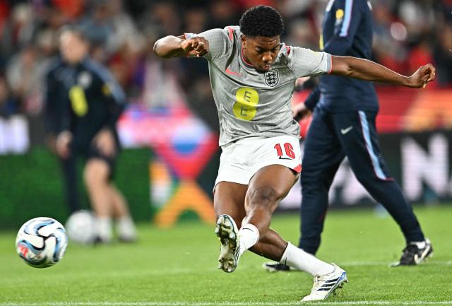 England's defender #16 Myles Lewis-Skelly warms up prior to the UEFA Nations League Group A3 football match between the Czech Republic and England at Fortuna Arena in Prague on September 29, 2026. (Photo by Joe Klamar / AFP)