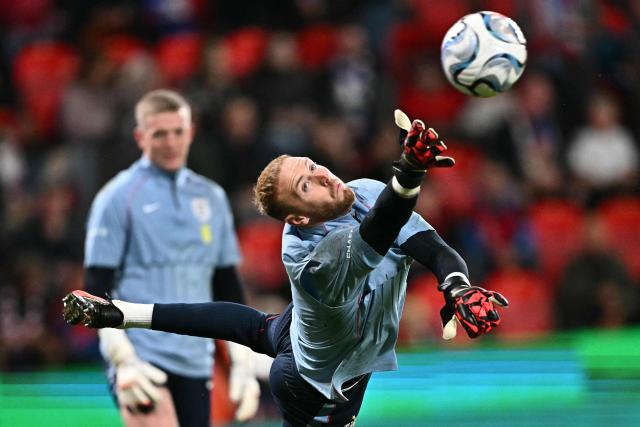 England's goalkeeper #23 Jason Steele dives for the ball during warm up prior to the UEFA Nations League Group A3 football match between the Czech Republic and England at Fortuna Arena in Prague on September 29, 2026. (Photo by Joe Klamar / AFP)