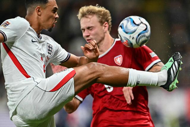 England's defender #02 Trent Alexander-Arnold (L) and Czech Republic's midfielder #09 Adam Karabec vie for the ball during the UEFA Nations League Group A3 football match between the Czech Republic and England at Fortuna Arena in Prague on September 29, 2026. (Photo by Joe Klamar / AFP)