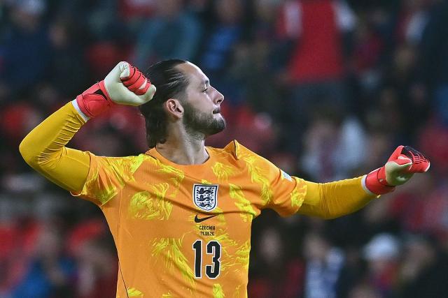 England's goalkeeper #13 James Trafford celebrates the opening goal during the UEFA Nations League Group A3 football match between the Czech Republic and England at Fortuna Arena in Prague on September 29, 2026. (Photo by Michal Cizek / AFP)
