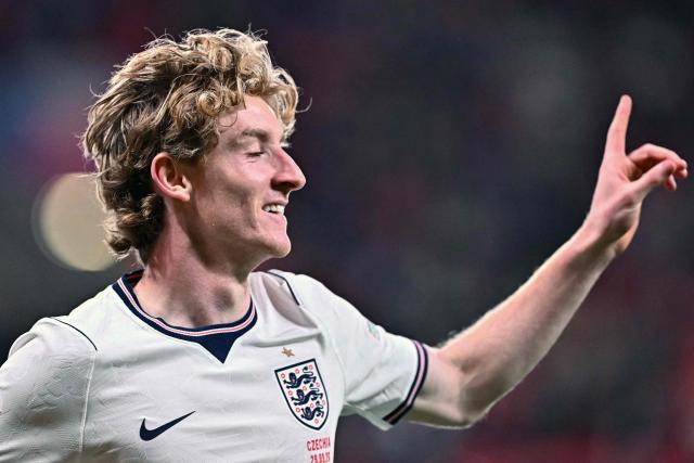 England's midfielder #11 Anthony Gordon celebrates scoring the opening goal during the UEFA Nations League Group A3 football match between the Czech Republic and England at Fortuna Arena in Prague on September 29, 2026. (Photo by Joe Klamar / AFP)