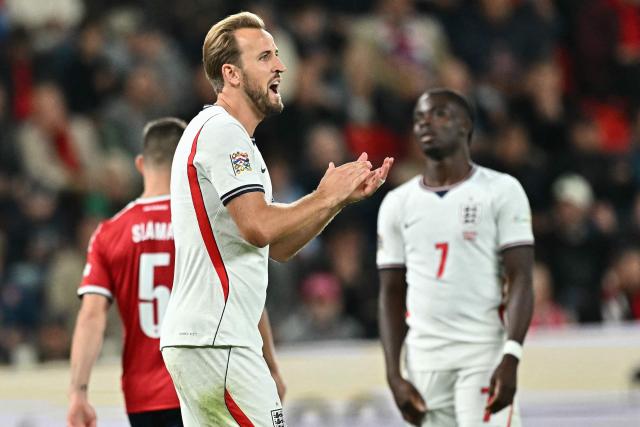 England's striker #09 Harry Kane and England's midfielder #07 Bukayo Saka (R) react during the UEFA Nations League Group A3 football match between the Czech Republic and England at Fortuna Arena in Prague on September 29, 2026. (Photo by Joe Klamar / AFP)