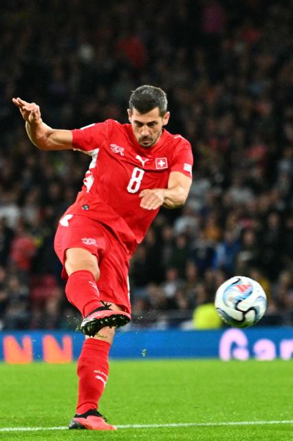 Switzerland's midfielder #08 Remo Freuler shoots but fails to score during the UEFA Nations League, League B, Group 1 match football match between Scotland and Switzerland at Hampden Park in Glasgow, Scotland on September 29, 2026.  (Photo by ANDY BUCHANAN / AFP)