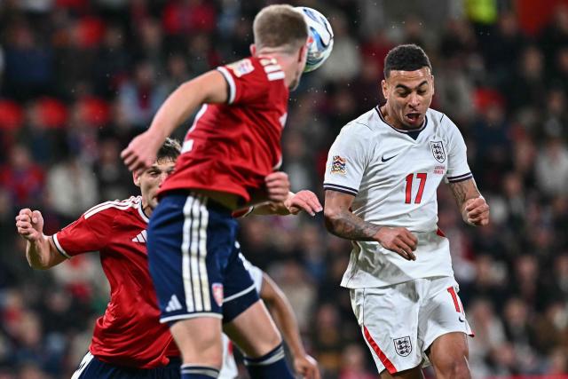 England striker #17 Morgan Rogers (R) heads the ball during the UEFA Nations League Group A3 football match between the Czech Republic and England at Fortuna Arena in Prague on September 29, 2026. (Photo by Joe Klamar / AFP)