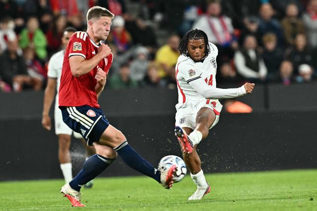 England forward #14 Rio Ngumoha (R) shoots past Czech Republic's midfielder #12 Lukas Cerv during the UEFA Nations League Group A3 football match between the Czech Republic and England at Fortuna Arena in Prague on September 29, 2026. (Photo by Joe Klamar / AFP)