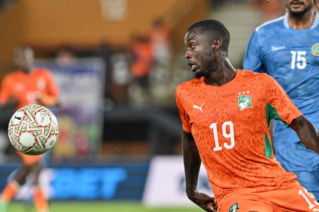 Ivory Coast's #19 Nicolas Pepe (L) eyes the ball during the 2027 CAF African Cup of Nations (CAN) group C qualification match between Ivory Coast and Somalia at the Felix Houphouet-Boigny stadium in Abidjan, on September 29, 2026. (Photo by Issouf SANOGO / AFP)