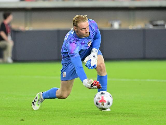 US goalkeeper #25 Chris Brady rolls the ball out during the international friendly football match between USA and Chile at Energizer Park in St. Louis, Missouri, on September 29, 2026. (Photo by TIM VIZER / AFP)