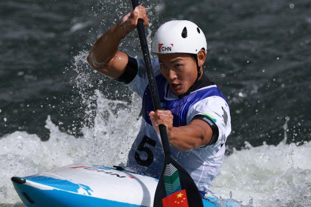 China's Hu Zhaoshan competes in the men's kayak single final in the canoe slalom event during the 2026 Asian Games at the Yahagigawa Canoe Slalom Course in Toyota on September 30, 2026. (Photo by DAVID GRAY / AFP)