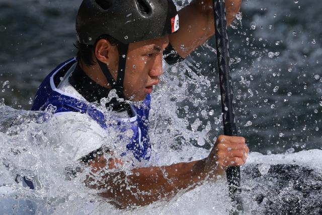 Japan's Yuuki Tanaka competes in the men's kayak single final in the canoe slalom event during the 2026 Asian Games at the Yahagigawa Canoe Slalom Course in Toyota on September 30, 2026. (Photo by DAVID GRAY / AFP)