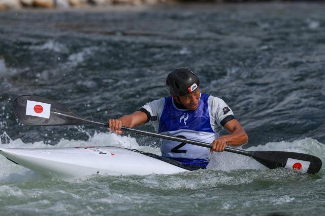 Japan's Yuuki Tanaka competes in the men's kayak single final in the canoe slalom event during the 2026 Asian Games at the Yahagigawa Canoe Slalom Course in Toyota on September 30, 2026. (Photo by DAVID GRAY / AFP)