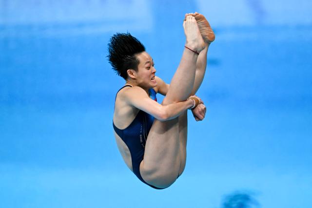 TOPSHOT - China's Chen Yiwen competes in the women's 3m springboard final diving event during the 2026 Asian Games at the Tokyo Aquatics Centre in Tokyo on September 30, 2026. (Photo by ANDREW CABALLERO-REYNOLDS / AFP)