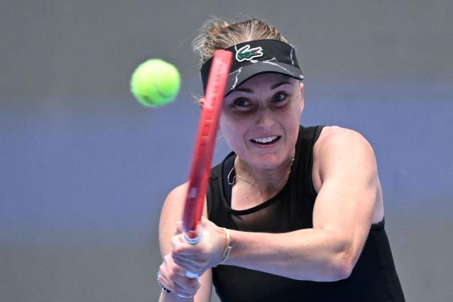Uzbekistan's Polina Kudermetova hits a return to China's Ma Yexin during their women's singles match at the China Open tennis tournament in Beijing on September 30, 2026. (Photo by WANG Zhao / AFP)