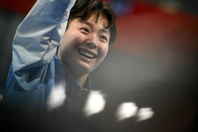 Gold medallist China's Chen Yiwen gestures following the women's 3m springboard final diving event during the 2026 Asian Games at the Tokyo Aquatics Centre in Tokyo on September 30, 2026. (Photo by ANDREW CABALLERO-REYNOLDS / AFP)