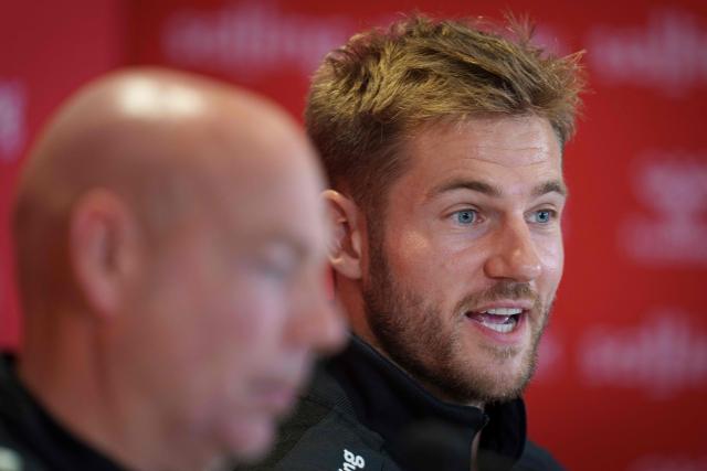 Denmark's head coach Brian Riemer (L) and Denmark's defender Joachim Andersen address a press conference in Helsingor on September 29, 2026, on the eve of their Nations League Group A4 match against Portugal. (Photo by Liselotte Sabroe / Ritzau Scanpix / AFP) / Denmark OUT