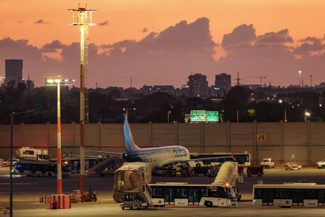 A flydubai Boeing 737 MAX 8 aircraft is pictured on the tarmac after landing at Israel's Ben Gurion Airport in Lod on September 30, 2026. A passenger on a rerouted flydubai flight that was bound for Tel Aviv said one of the pilots tried to crash the plane and kill everyone on board, after both pilots were found to be wounded on landing in Saudi Arabia. In the first comment by an official, Israel's far-right national security minister Itamar Ben Gvir alleged an attempted "terrorist" attack in the incident, in which none of the passengers reported injuries. (Photo by Jack GUEZ / AFP)