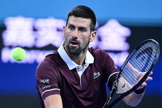 Serbia's Novak Djokovic hits a return to Portugal's Nuno Borges during their men's singles first-round match at the China Open tennis tournament in Beijing on September 30, 2026. (Photo by Adek BERRY / AFP)