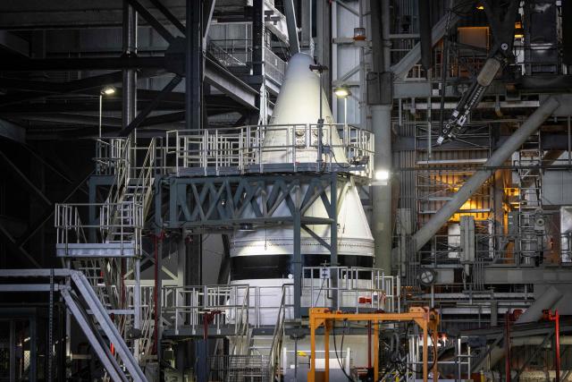 The nose cone of a solid rocket booster of the Space Launch System (SLS) for Artemis III is seen inside the Vehicle Assembly Building (VAB) at Kennedy Space Center, in Cape Canaveral, Florida, on September 30, 2026. Artemis III is an upcoming crewed mission led by the NASA Artemis program, targeting a 2027 launch. (Photo by Marco BELLO / AFP)