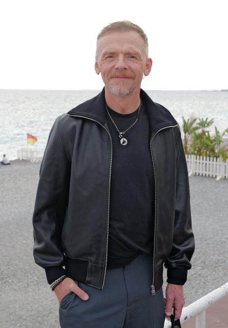 British actor Simon Pegg poses during a photocall  for the movie “Only What We Carry” at the Cineroman film festival in Nice, southeastern France on September 30, 2026. (Photo by Valery HACHE / AFP)