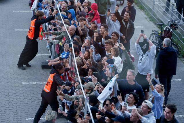 Fans of Portugal's players including forward #07 Cristiano Ronaldo wait see them arriving for a training session at Parken stadium in Copenhagen, Denmark, on September 30, 2026, on the eve of their Nations League Group A4 match against Denmark. (Photo by Liselotte Sabroe / Ritzau Scanpix / AFP) / Denmark OUT
