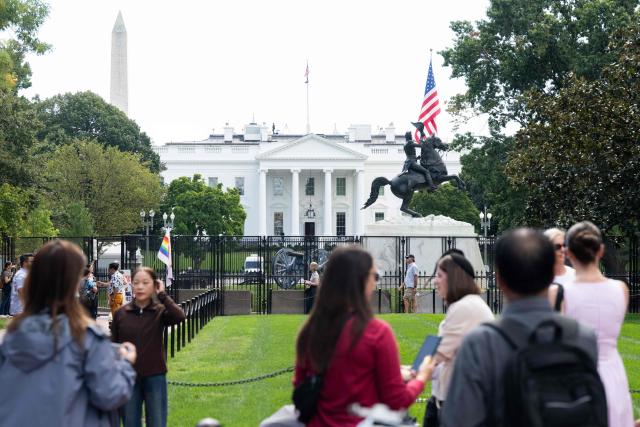 Tourists visit Lafayette Park near the White House in Washington, DC, September 30, 2026, following a partial re-opening of the park after a renovation. (Photo by SAUL LOEB / AFP)