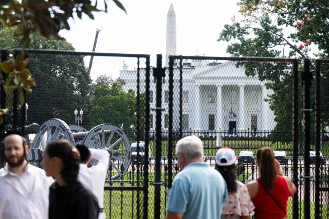 Tourists visit Lafayette Park near the White House in Washington, DC, September 30, 2026, following a partial re-opening of the park after a renovation. (Photo by SAUL LOEB / AFP)