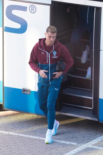 Portugal's forward #07 Cristiano Ronaldo arrives for a training session at Parken stadium in Copenhagen, Denmark, on September 30, 2026, on the eve of their Nations League Group A4 match against Denmark. Portugal captain Cristiano Ronaldo announced that he had left the team's training camp in Denmark following a press conference by coach Jorge Jesus. (Photo by Liselotte Sabroe / Ritzau Scanpix / AFP) / Denmark OUT