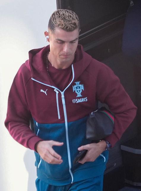Portugal's forward #07 Cristiano Ronaldo arrives for a training session at Parken stadium in Copenhagen, Denmark, on September 30, 2026, on the eve of their Nations League Group A4 match against Denmark. Portugal captain Cristiano Ronaldo announced that he had left the team's training camp in Denmark following a press conference by coach Jorge Jesus. (Photo by Liselotte Sabroe / Ritzau Scanpix / AFP) / Denmark OUT