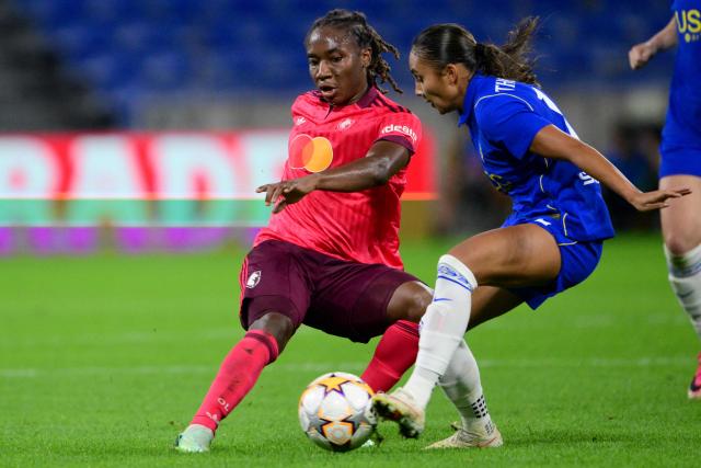 Lyon's Haitian midfielder #06 Melchie Dumonay (L) and Chelsea's US forward #12 Alyssa Thompson (R) fight for the ball during the UEFA Women's Champions League - League phase, Matchday 2 - football match between OL Lyonnes and Chelsea FC Women at the Parc Olympique Lyonnais stadium in Decines-Charpieu, central-eastern France, on September 30, 2026. (Photo by OLIVIER CHASSIGNOLE / AFP)