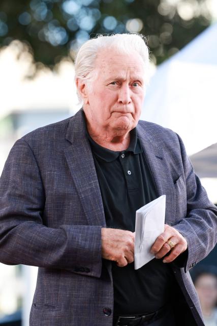 US actor Martin Sheen walks to the podum to speak at US actor Bradley Whitford's Hollywood Walk of Fame star ceremony in Hollywood, California on September 30, 2026. (Photo by VALERIE MACON / AFP)