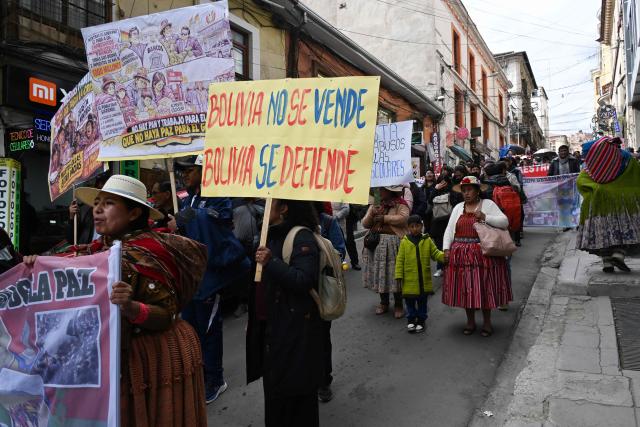 Education workers take part in a protest march through the streets of La Paz, Bolivia, on September 30, 2026. Teachers are demanding wage increases in line with the rising cost of the basic food basket and the repeal of decrees that, according to their union, have affected their economic situation. (Photo by Aizar RALDES / AFP)