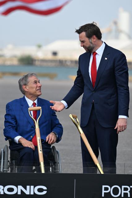 US Vice President JD Vance (R) with alongside Texas Governor Greg Abbott, participate in a groundbreaking ceremony for a multibillion-dollar shipyard project at the Port of Brownsville in Brownsville, Texas on September 30, 2026. (Photo by Kenny Holston/The New York Times / POOL / AFP)