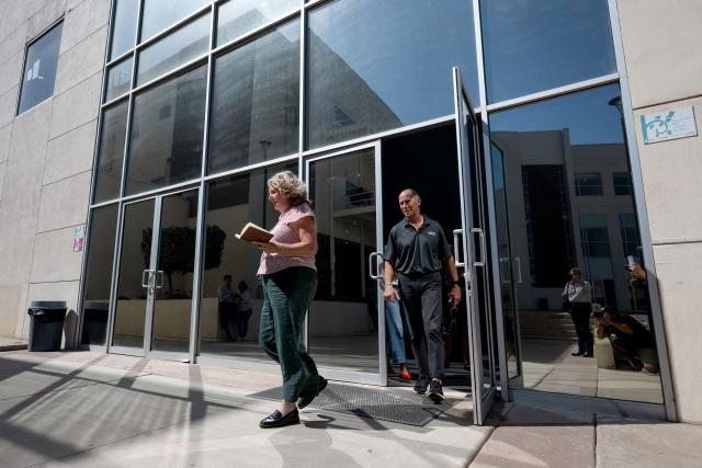 Debra and Martin Robinson, parents of Australian brothers Callum and Jake Robinson, murdered in April 2024 during a surfing trip, leave the court on a trial of the alleged killers of their sons in Ensenada, Baja California state, Mexico on September 30, 2026. The suspected murderers of two Australian surfers and an American at a Mexican surfing hotspot went on trial on September 7, 2026, two years after their killings in a suspected robbery. (Photo by Guillermo Arias / AFP)