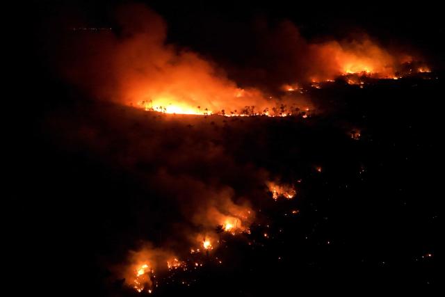 This aerial view shows a wildfire in the Amazon rainforest in Iranduba, Amazonas state, Brazil on September 30, 2026. (Photo by MICHAEL DANTAS / AFP)